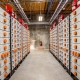 Deeper decarbonization via battery energy storage systems